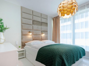 VacationClub – ApartPark Lividius Apartament 137